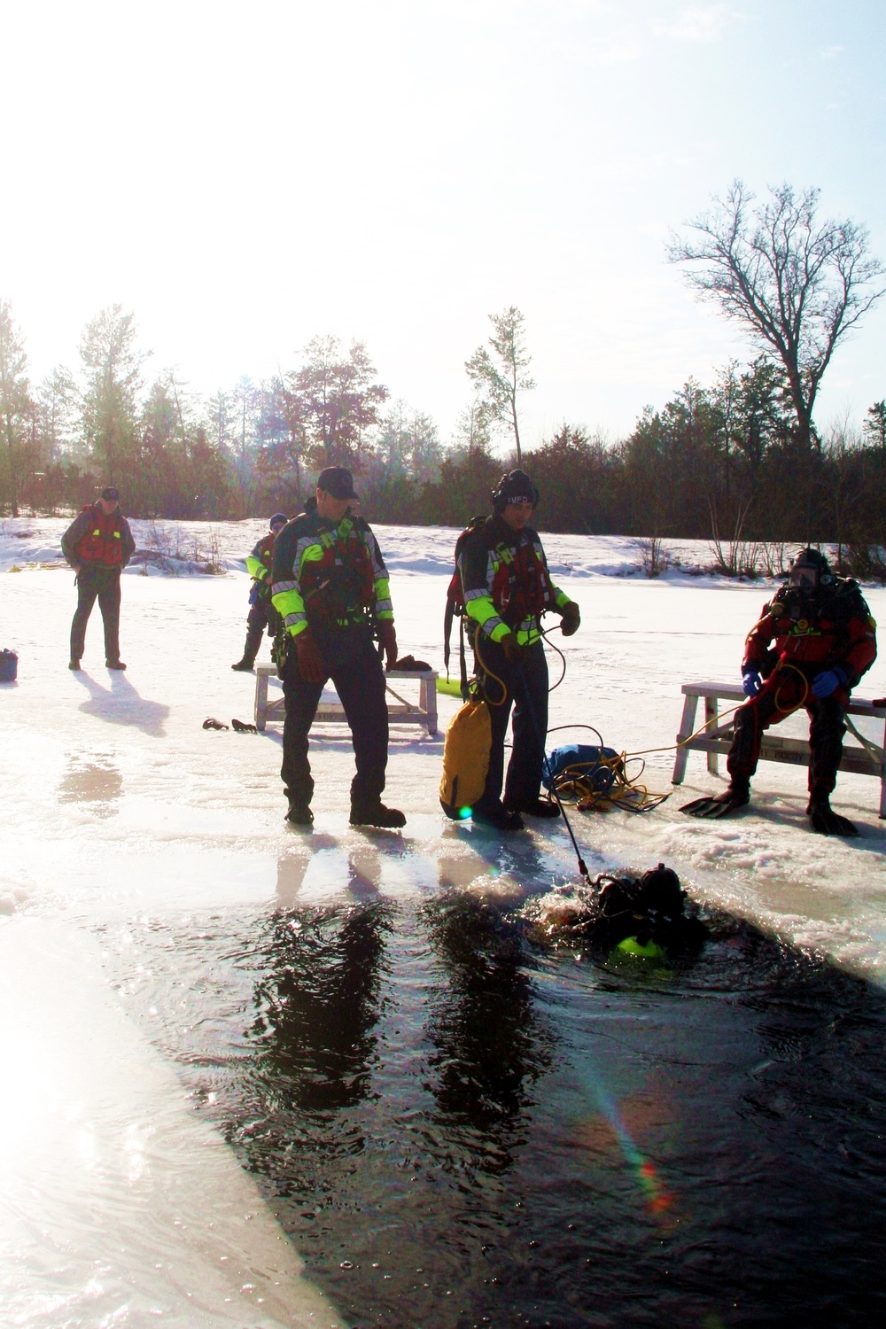 Fort McCoy Fire Department dive team conducts ice rescue training at frozen lake at Fort McCoy