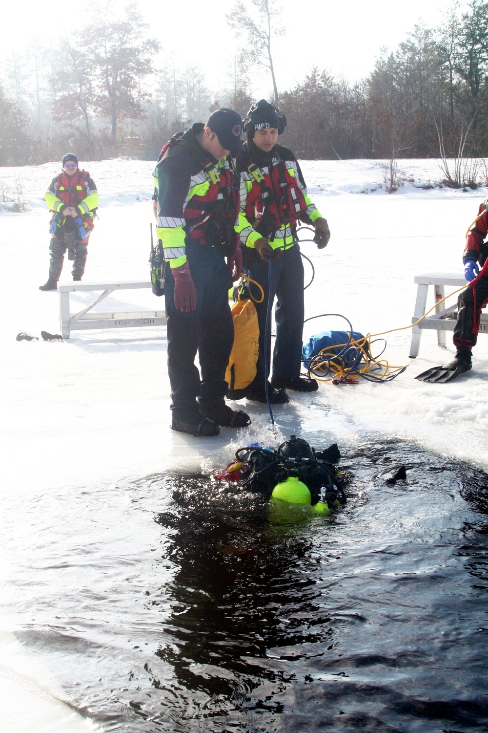 Fort McCoy Fire Department dive team conducts ice rescue training at frozen lake at Fort McCoy