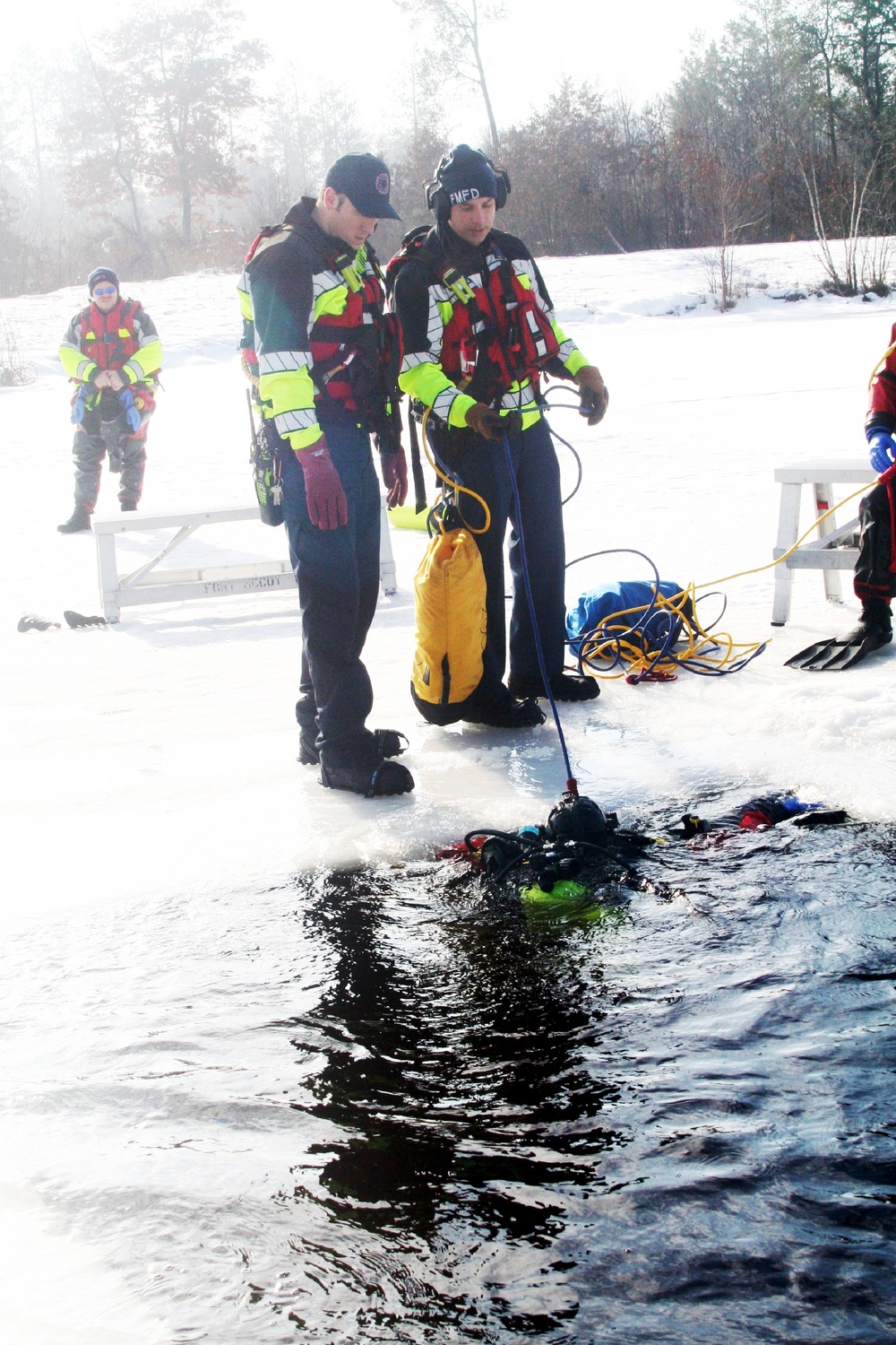 Fort McCoy Fire Department dive team conducts ice rescue training at frozen lake at Fort McCoy