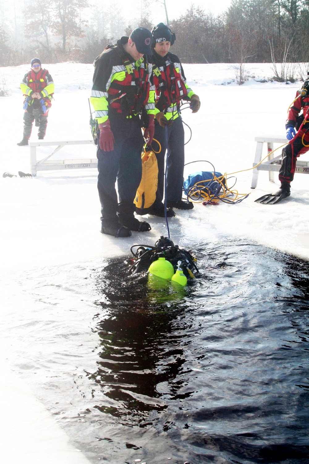 Fort McCoy Fire Department dive team conducts ice rescue training at frozen lake at Fort McCoy