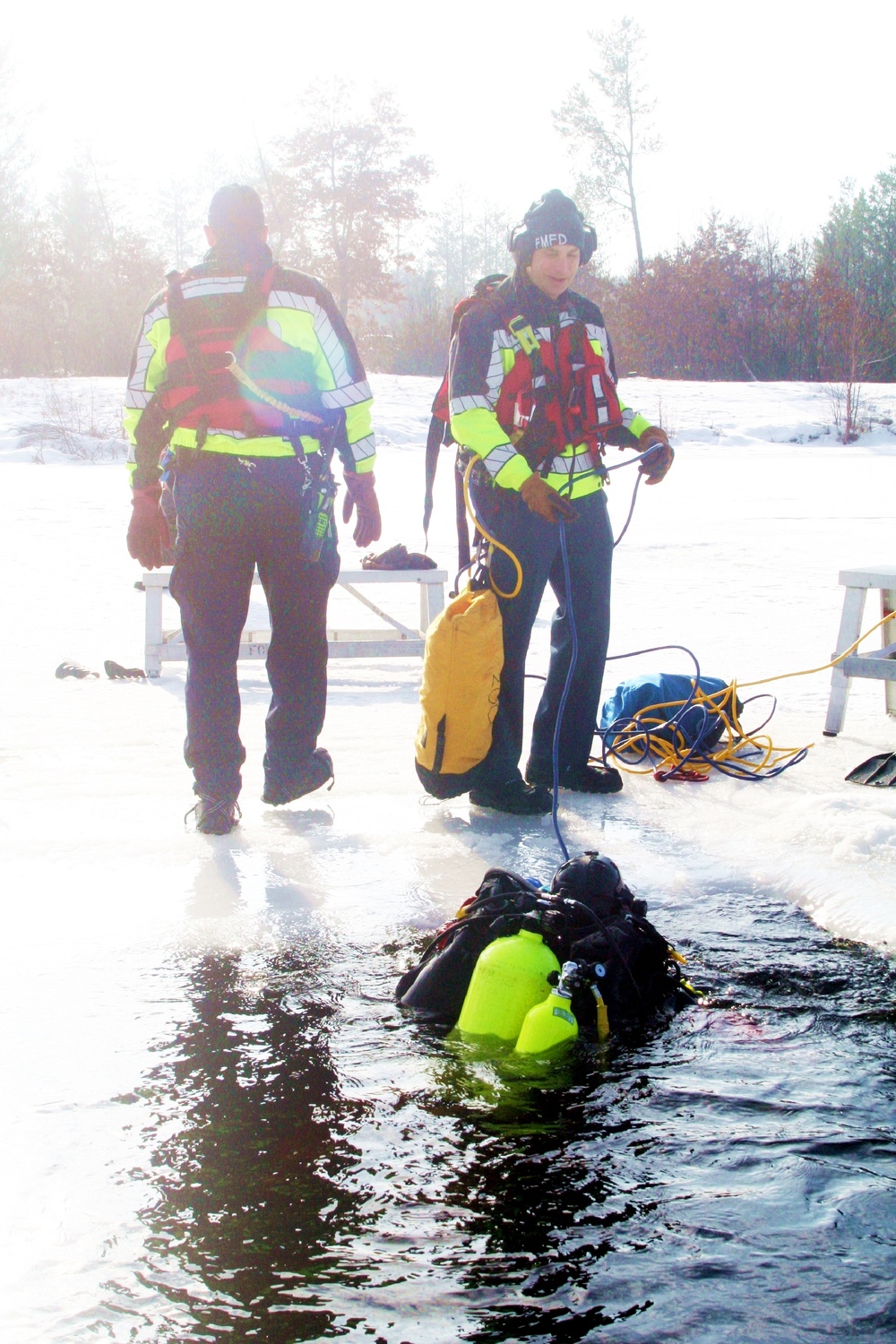 Fort McCoy Fire Department dive team conducts ice rescue training at frozen lake at Fort McCoy