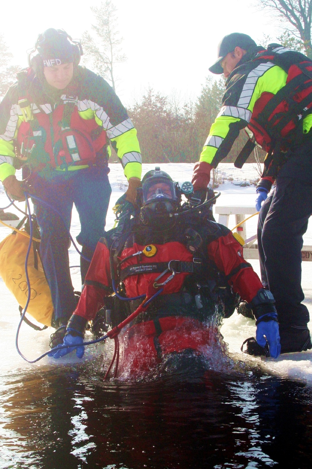 Fort McCoy Fire Department dive team conducts ice rescue training at frozen lake at Fort McCoy