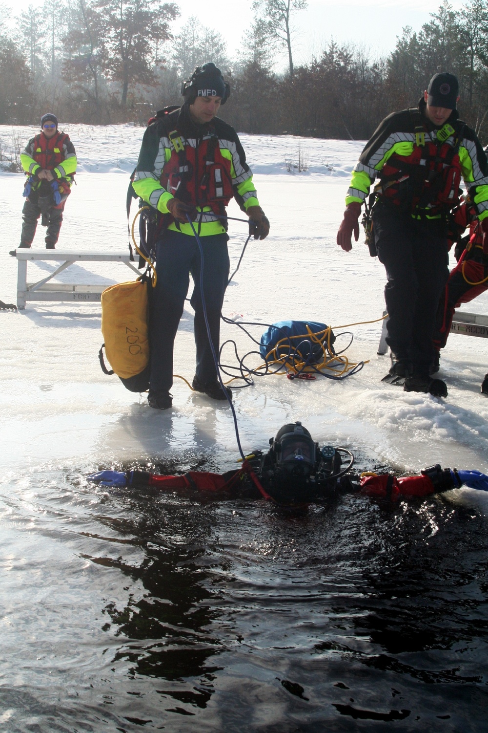 Fort McCoy Fire Department dive team conducts ice rescue training at frozen lake at Fort McCoy