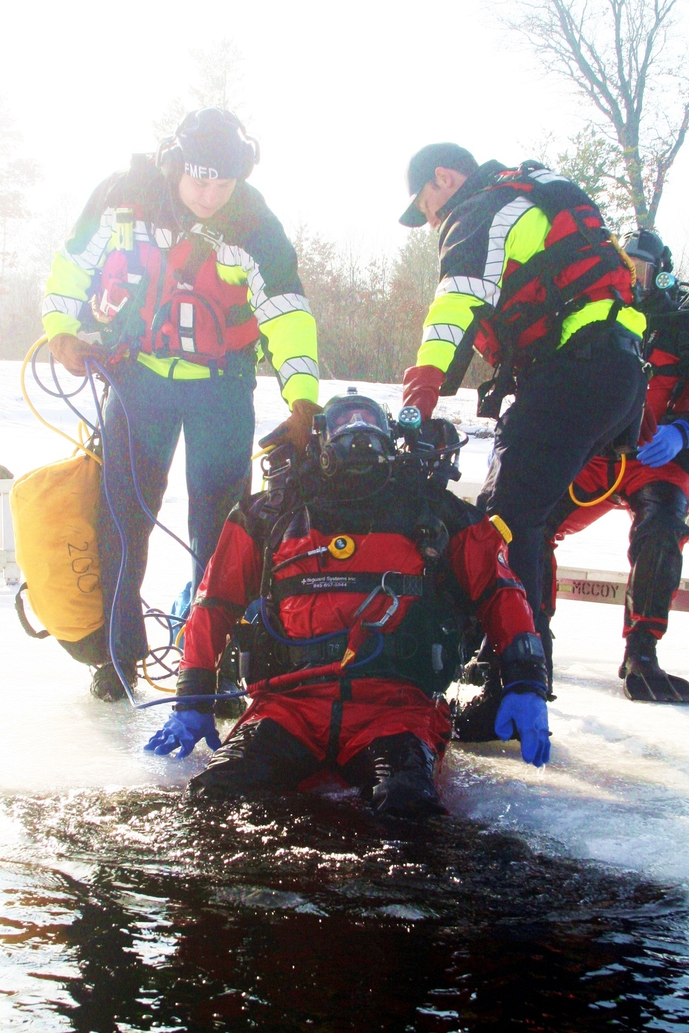 Fort McCoy Fire Department dive team conducts ice rescue training at frozen lake at Fort McCoy