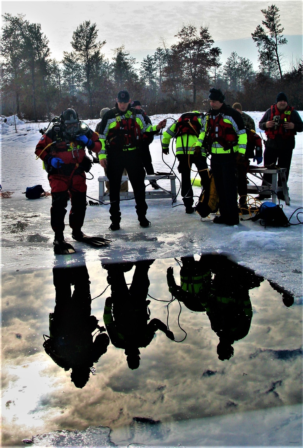 Fort McCoy Fire Department dive team conducts ice rescue training at frozen lake at Fort McCoy