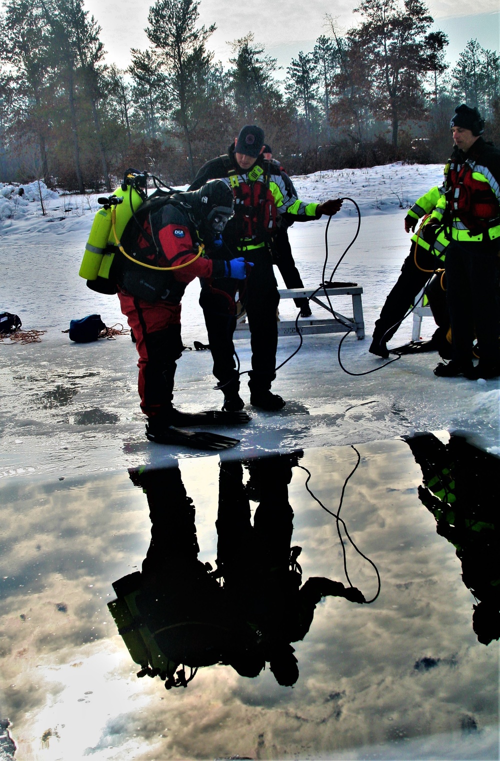 Fort McCoy Fire Department dive team conducts ice rescue training at frozen lake at Fort McCoy