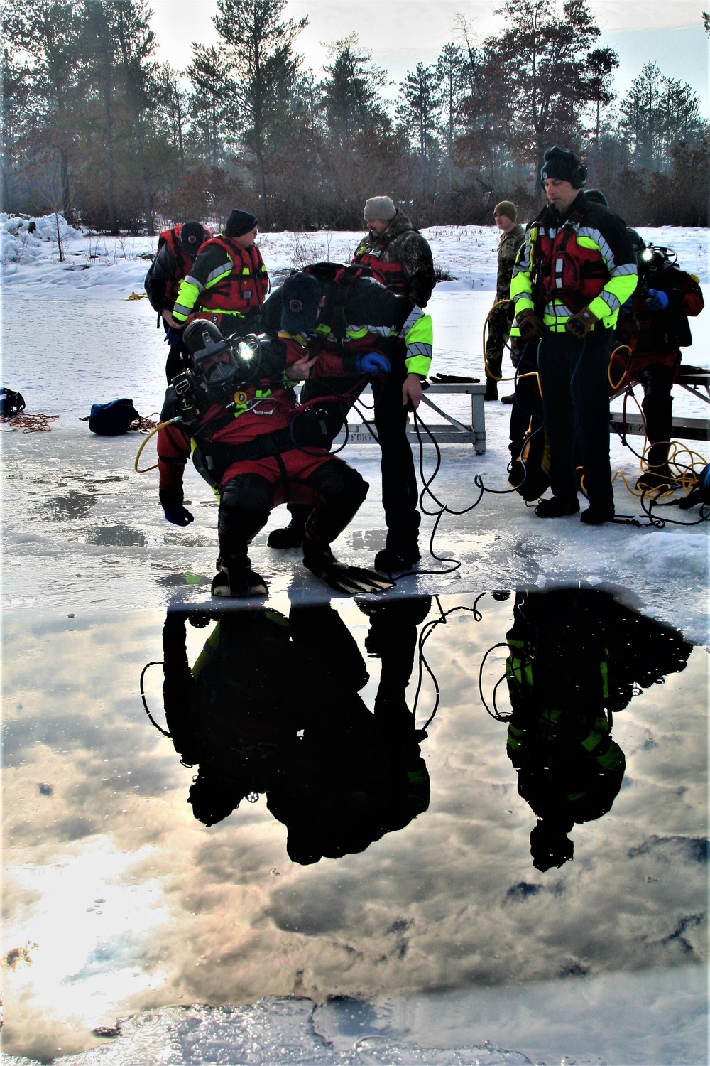 Fort McCoy Fire Department dive team conducts ice rescue training at frozen lake at Fort McCoy