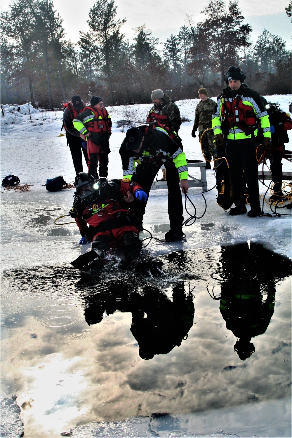 Fort McCoy Fire Department dive team conducts ice rescue training at frozen lake at Fort McCoy