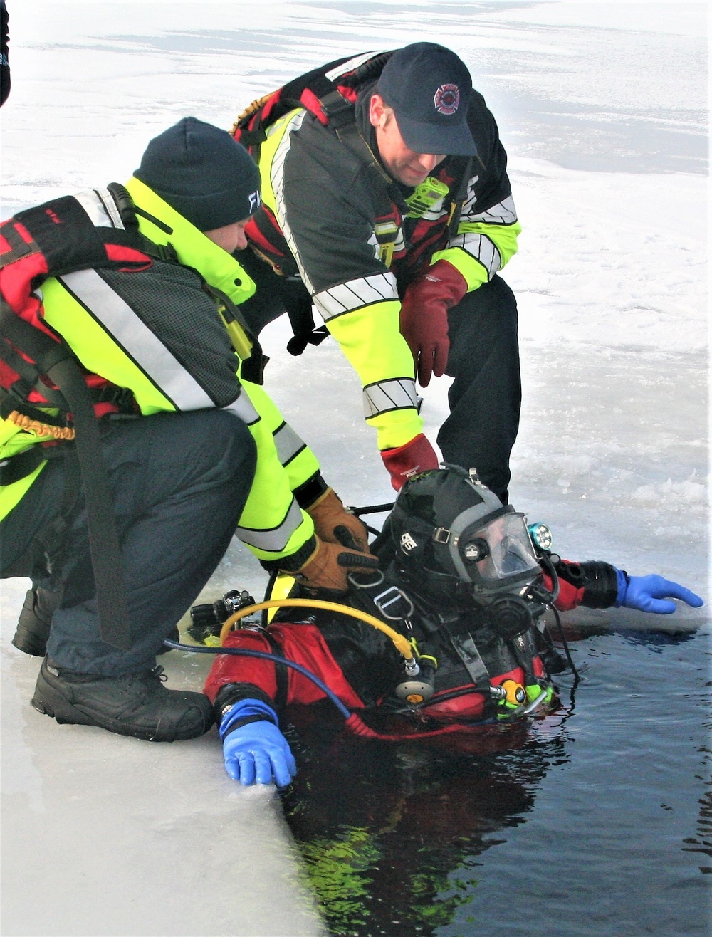 Fort McCoy Fire Department dive team conducts ice rescue training at frozen lake at Fort McCoy