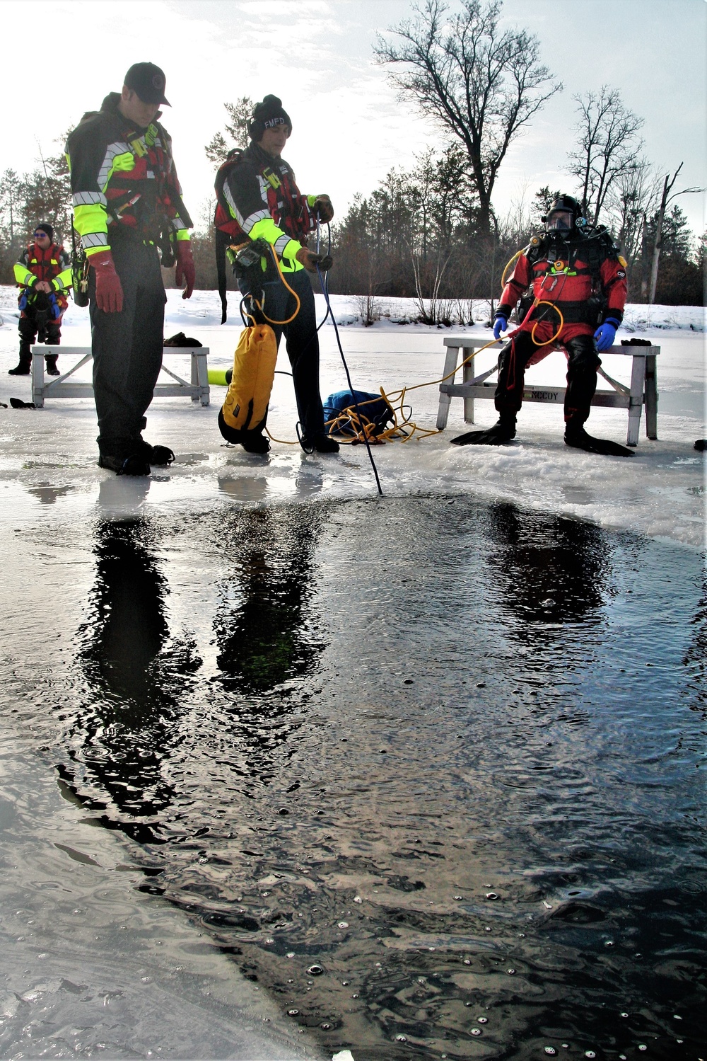 Fort McCoy Fire Department dive team conducts ice rescue training at frozen lake at Fort McCoy