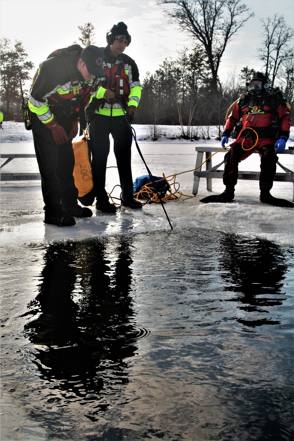 Fort McCoy Fire Department dive team conducts ice rescue training at frozen lake at Fort McCoy