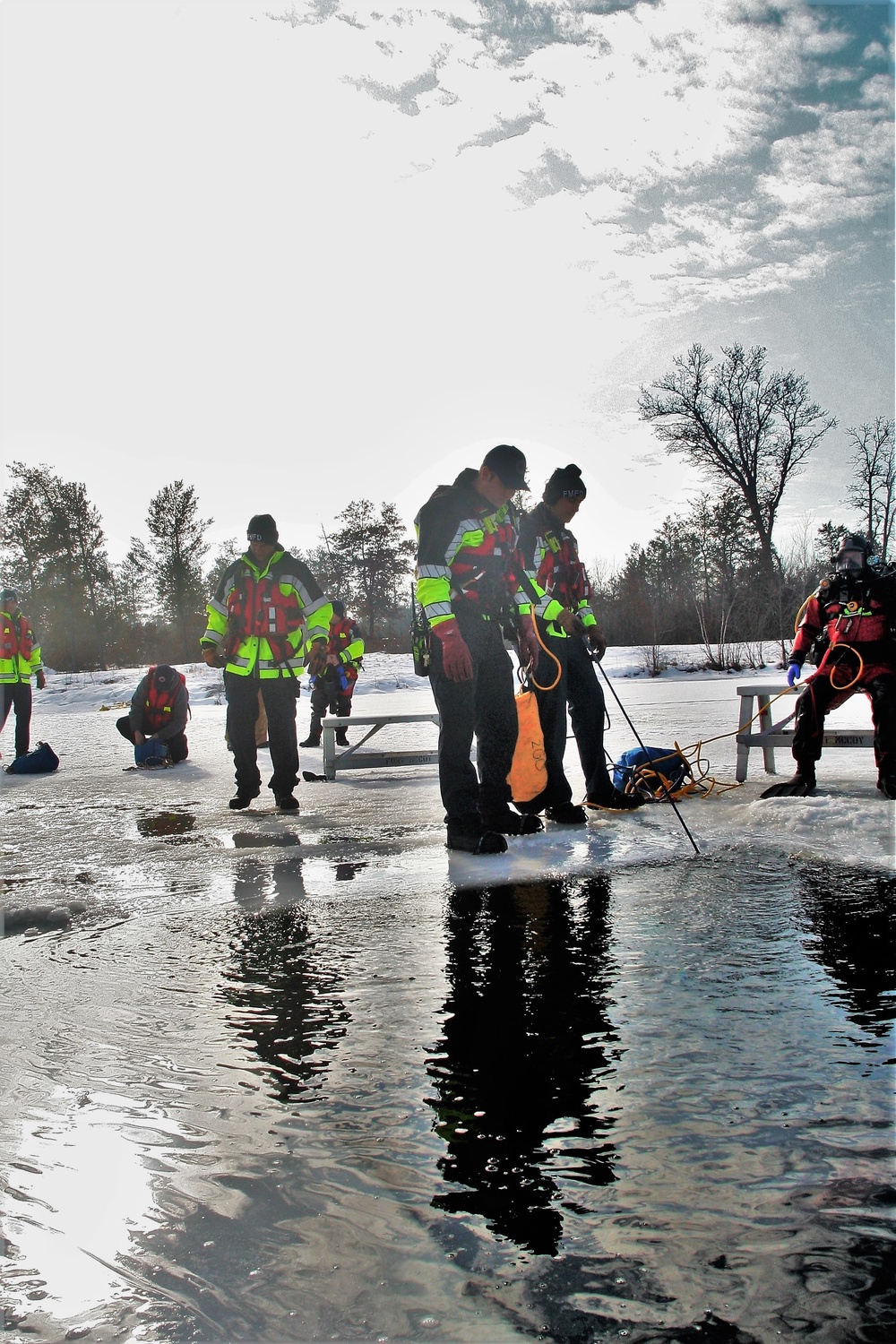 Fort McCoy Fire Department dive team conducts ice rescue training at frozen lake at Fort McCoy