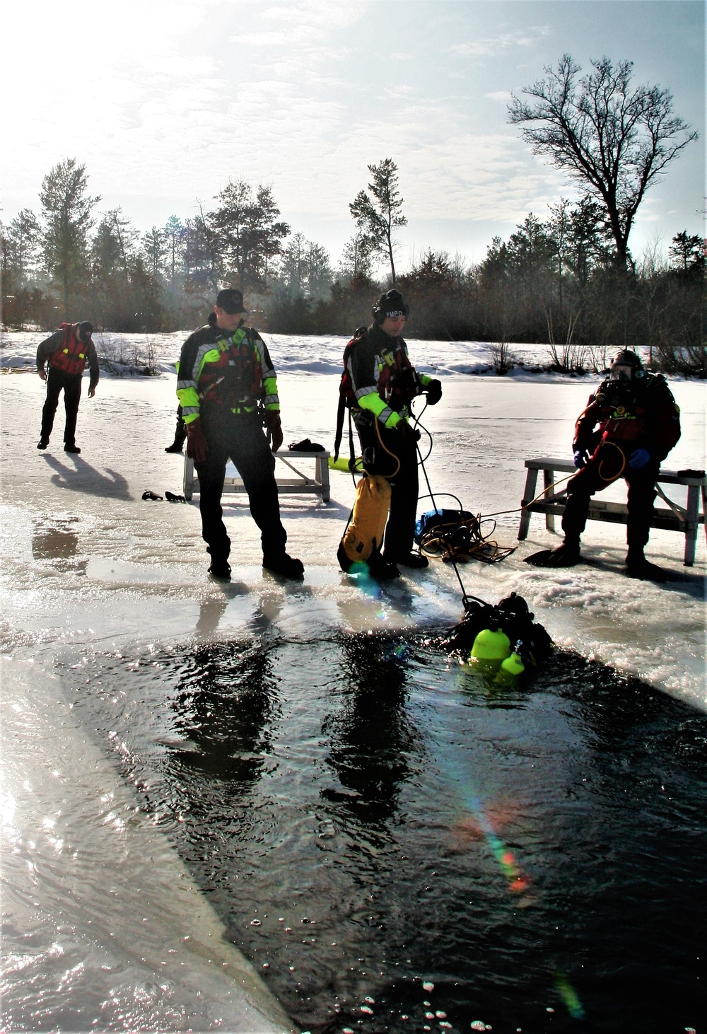 Fort McCoy Fire Department dive team conducts ice rescue training at frozen lake at Fort McCoy