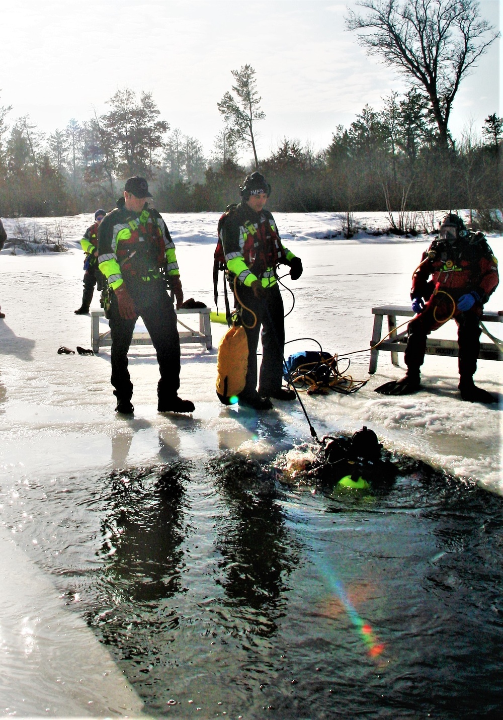 Fort McCoy Fire Department dive team conducts ice rescue training at frozen lake at Fort McCoy