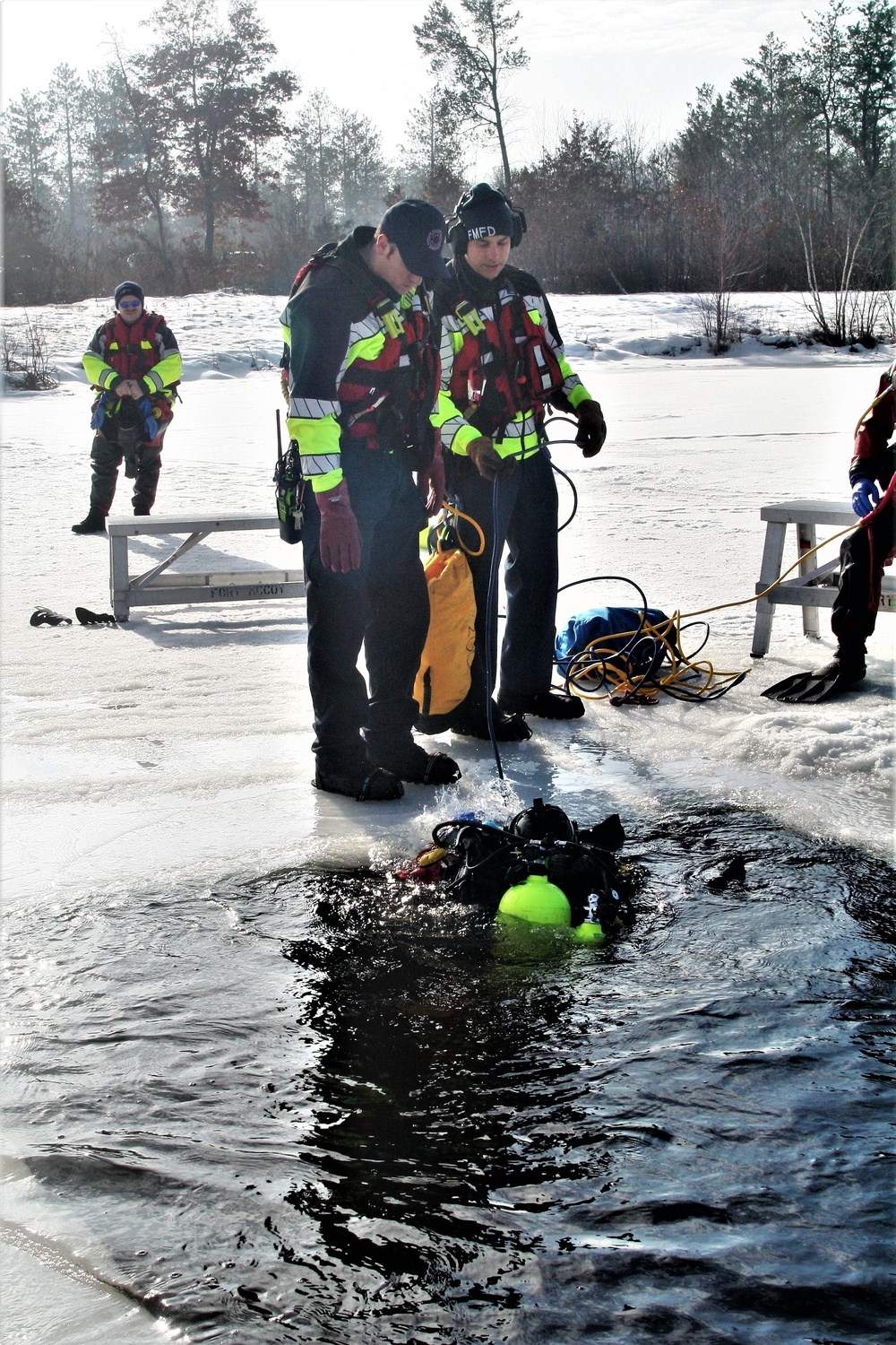 Fort McCoy Fire Department dive team conducts ice rescue training at frozen lake at Fort McCoy