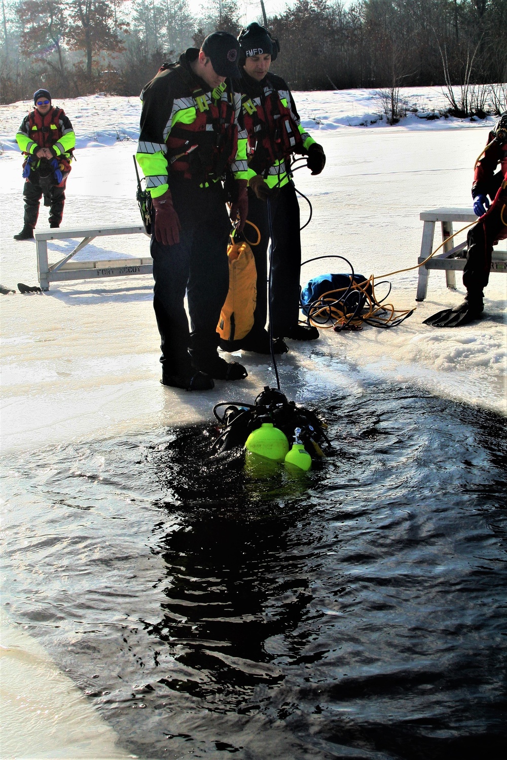 Fort McCoy Fire Department dive team conducts ice rescue training at frozen lake at Fort McCoy