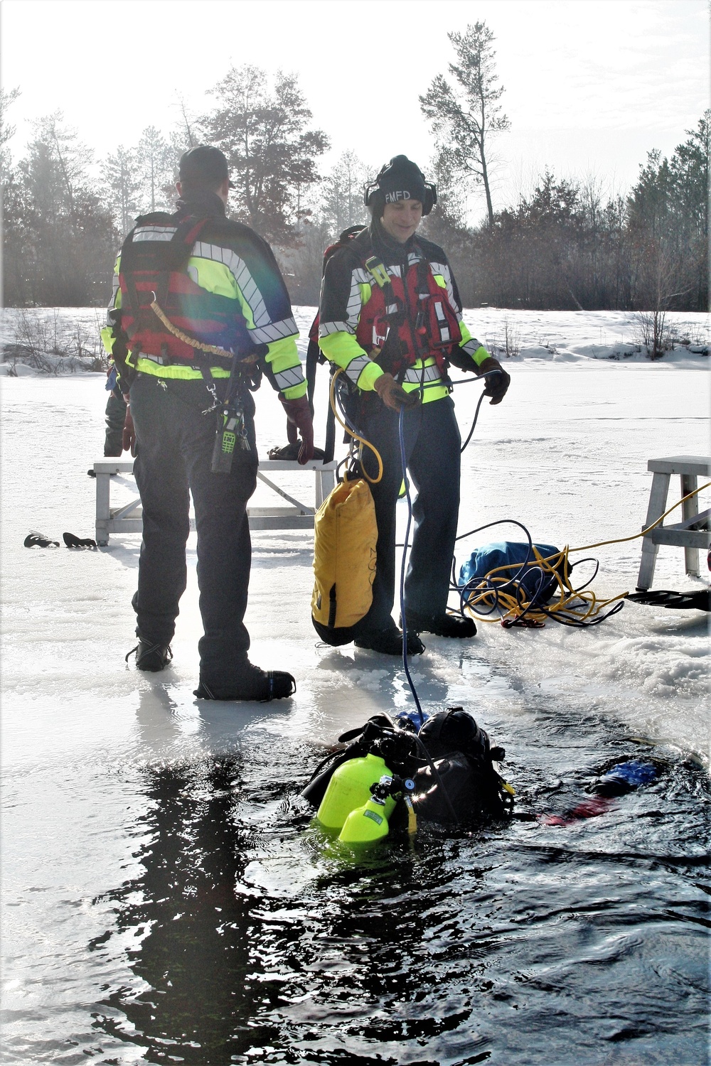 Fort McCoy Fire Department dive team conducts ice rescue training at frozen lake at Fort McCoy