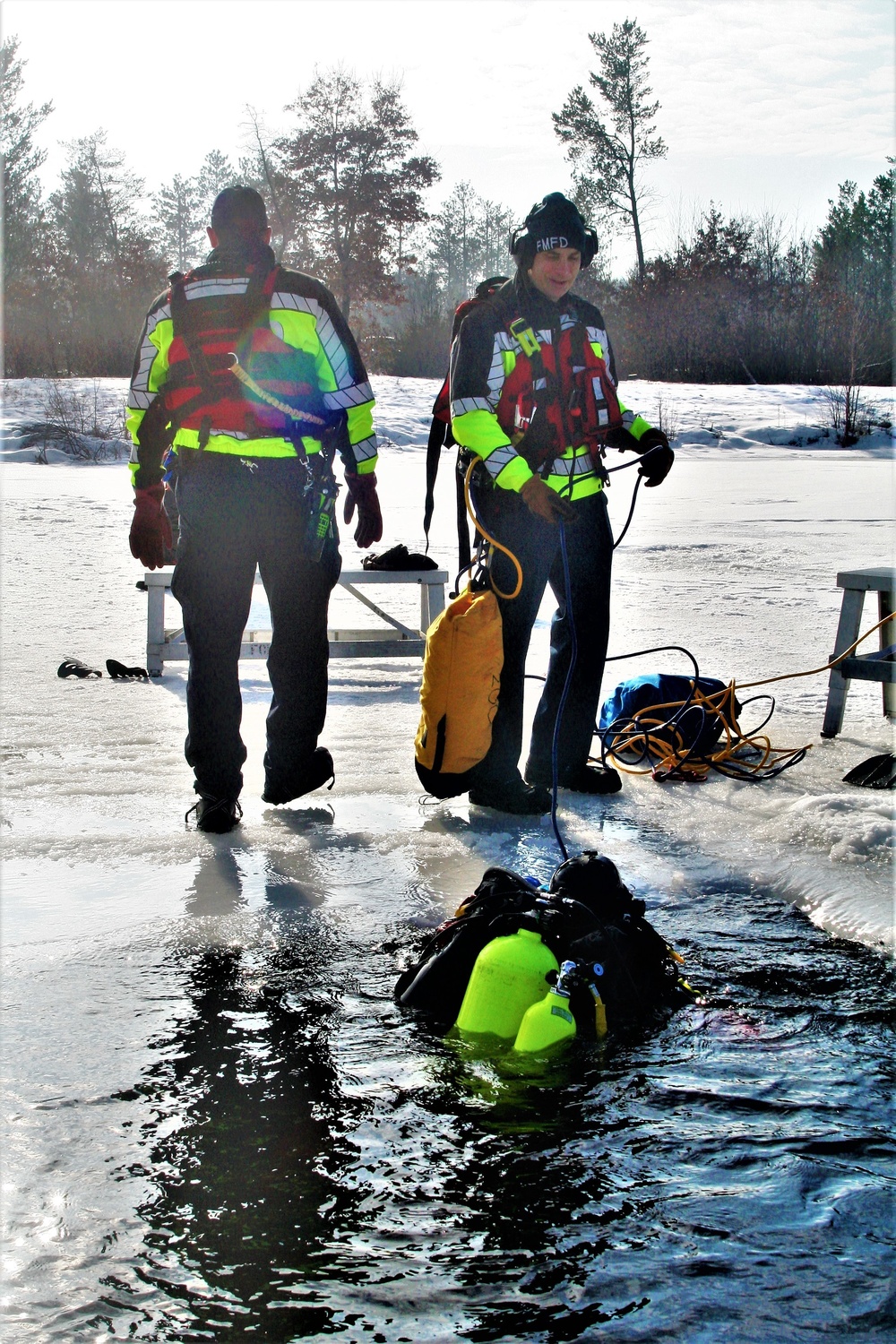 Fort McCoy Fire Department dive team conducts ice rescue training at frozen lake at Fort McCoy