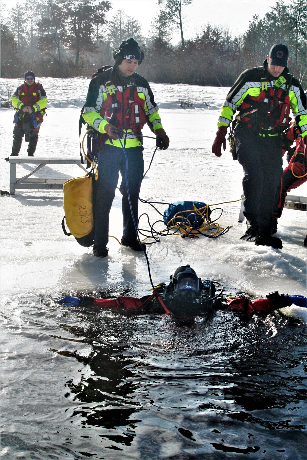 Fort McCoy Fire Department dive team conducts ice rescue training at frozen lake at Fort McCoy