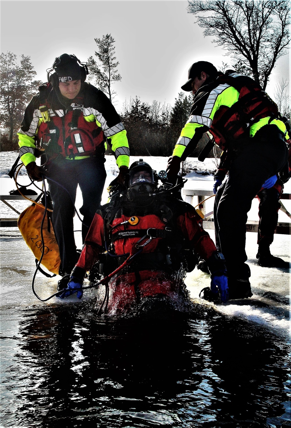 Fort McCoy Fire Department dive team conducts ice rescue training at frozen lake at Fort McCoy