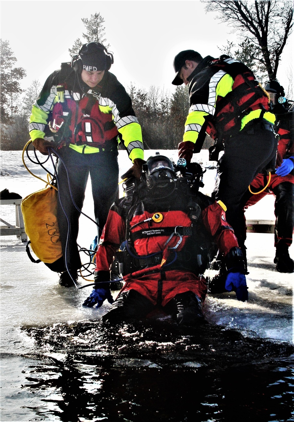 Fort McCoy Fire Department dive team conducts ice rescue training at frozen lake at Fort McCoy