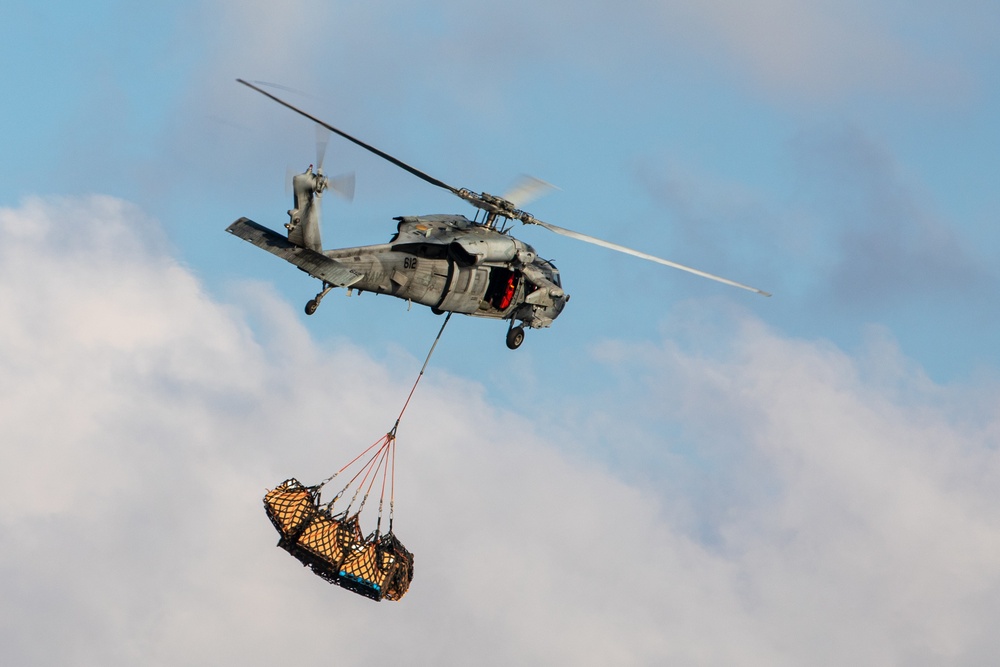 MH-60S Sea Hawk Helicopter Transports Supplies