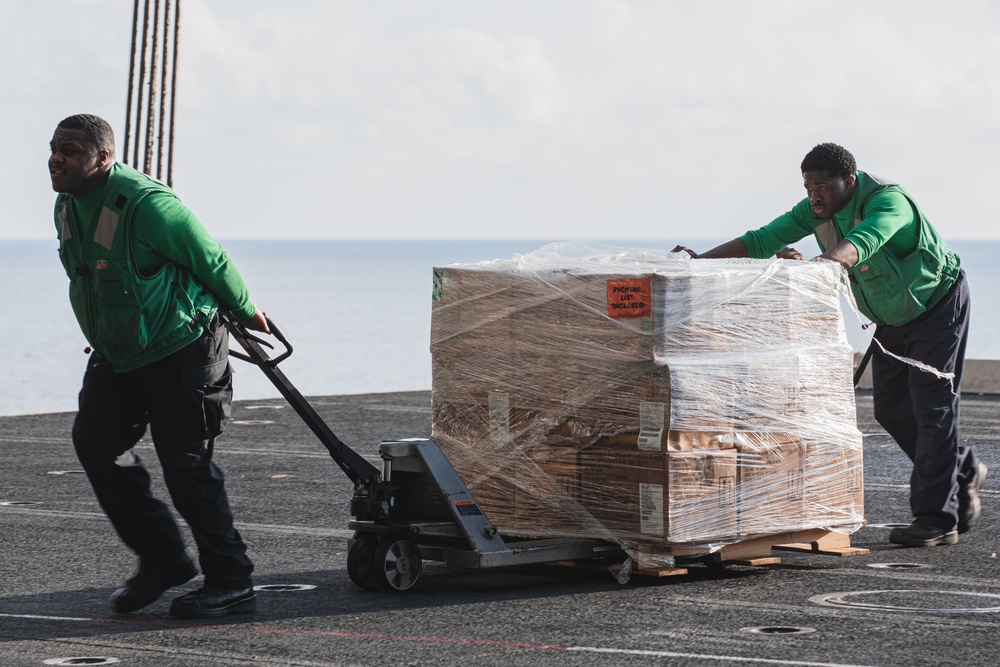 U.S. Sailors Haul Replenishment Supplies