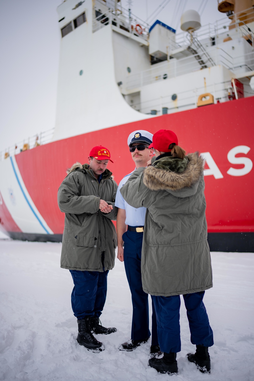 Coast Guard Cutter Polar Star (WAGB 10) conducts an advancement ceremony on the ice in Antarctica