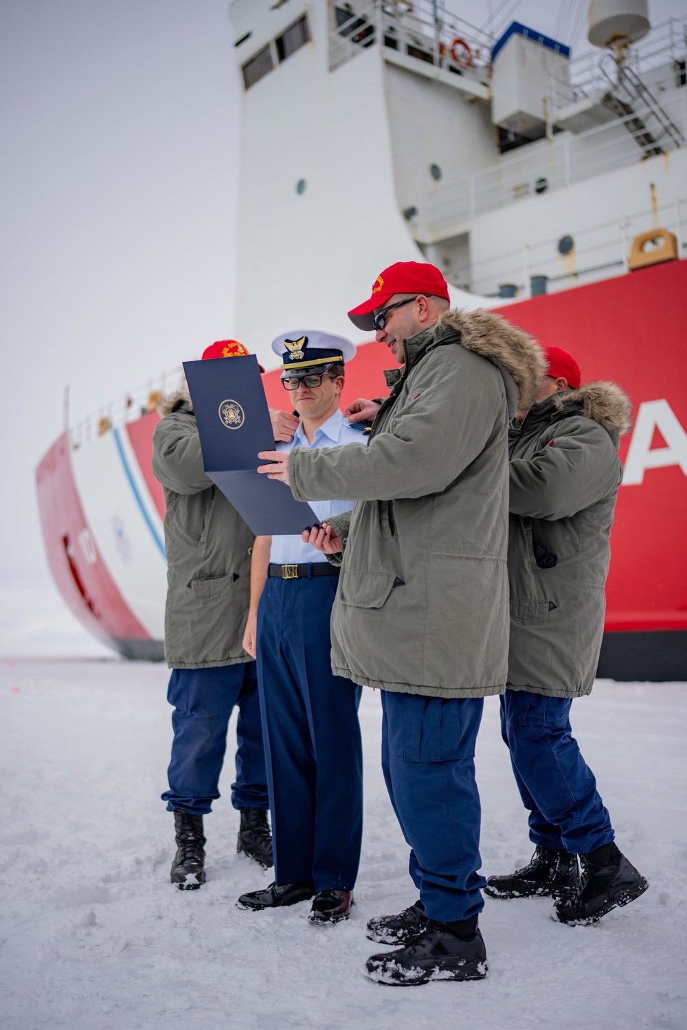 Coast Guard Cutter Polar Star (WAGB 10) conducts an advancement ceremony on the ice in Antarctica