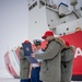 Coast Guard Cutter Polar Star (WAGB 10) conducts an advancement ceremony on the ice in Antarctica