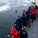 Coast Guard Cutter Polar Star (WAGB 10) receives a visit from some Orcas