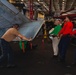 U.S. Sailors Fold Helicopter Tail