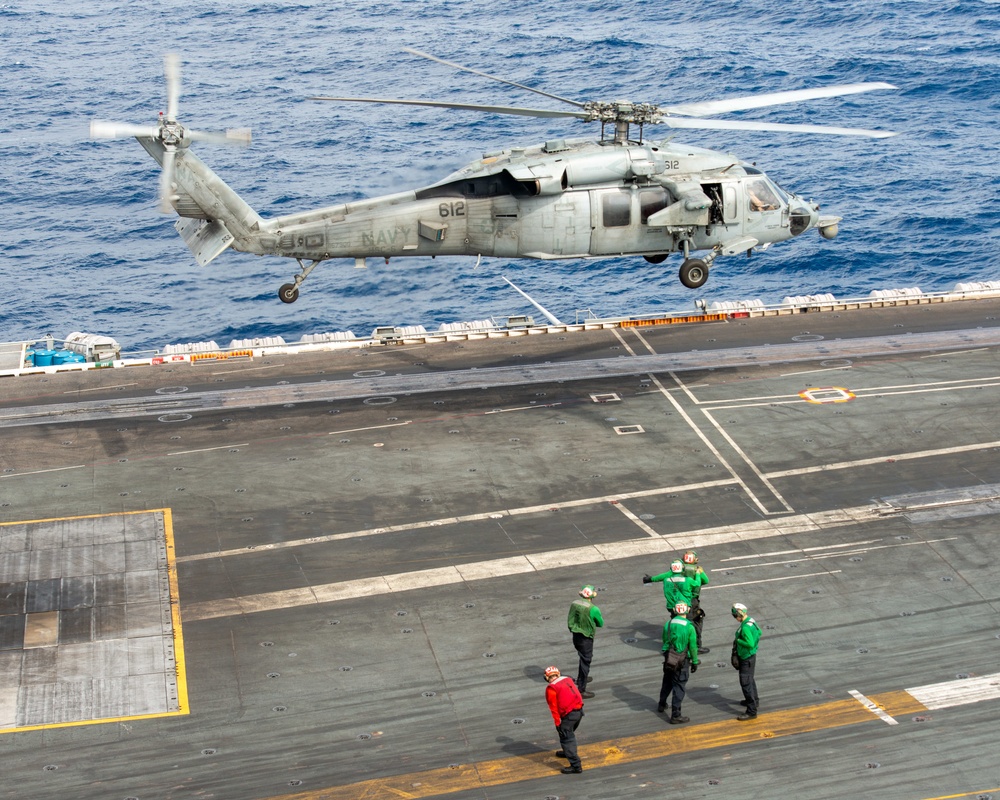 Helicopter Takes Off From Flight Deck