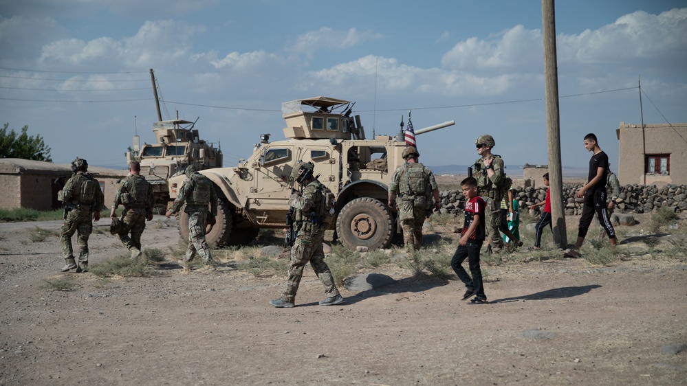 Combined Joint Task Force - Operation Inherent Resolve visit a local village in Syria