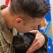319th Security Forces Squadron military working dog retires to a civilian couch
