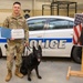 319th Security Forces Squadron military working dog retires to a civilian couch