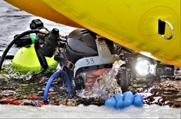 Fort McCoy firefighters hold ice rescue diving training at frozen-over installation lake