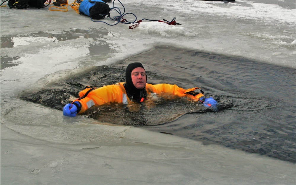 Fort McCoy firefighters train to save people clinging to ice with surface ice rescue training