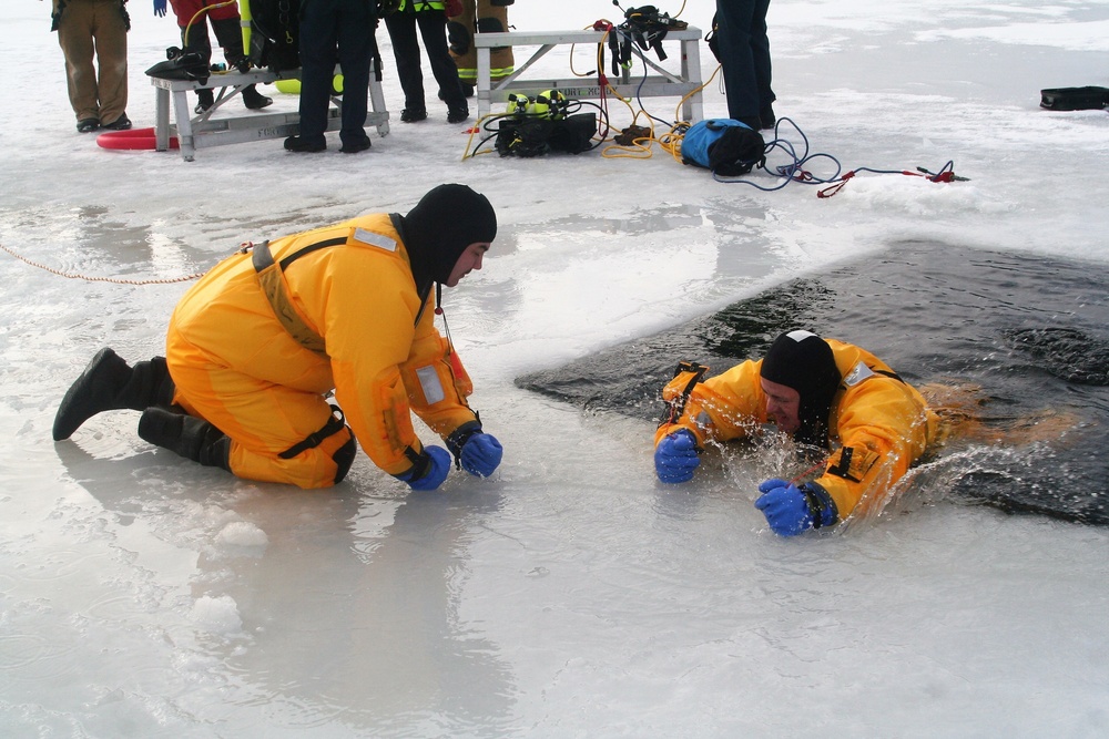 Fort McCoy firefighters train to save people clinging to ice with surface ice rescue training