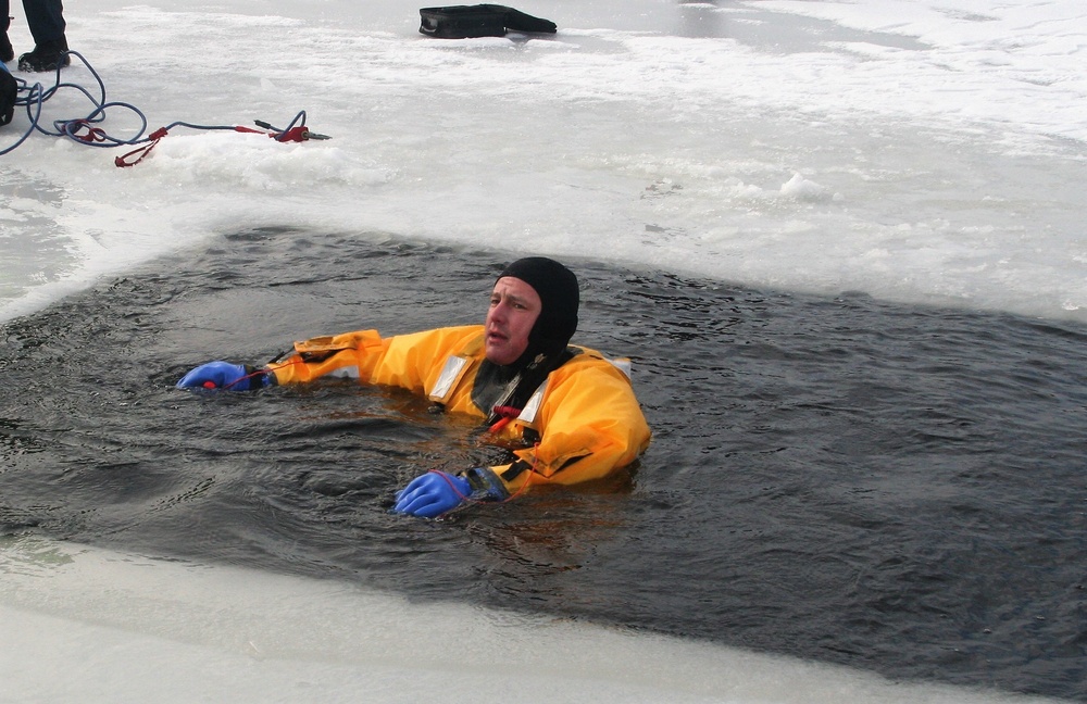 Fort McCoy firefighters train to save people clinging to ice with surface ice rescue training