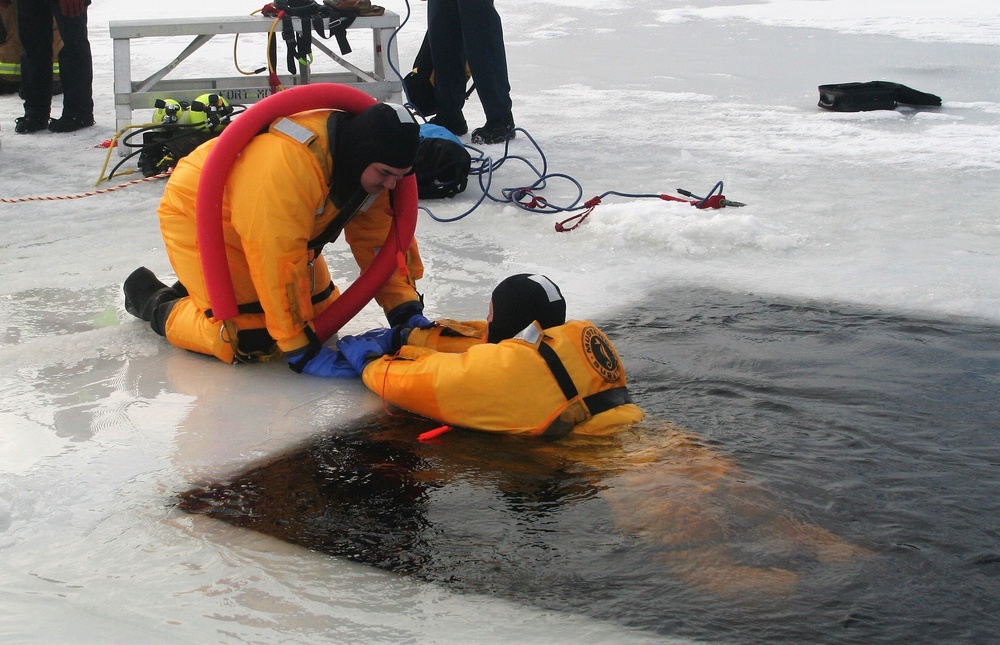 Fort McCoy firefighters train to save people clinging to ice with surface ice rescue training