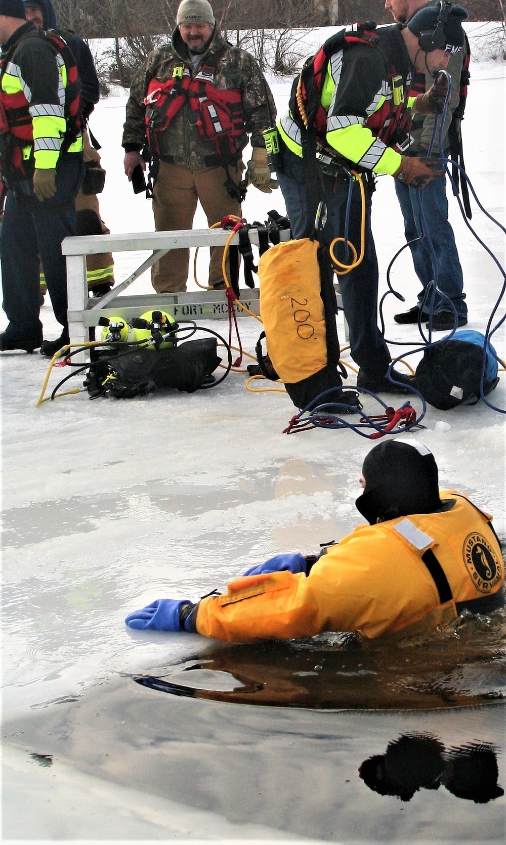 Fort McCoy firefighters train to save people clinging to ice with surface ice rescue training