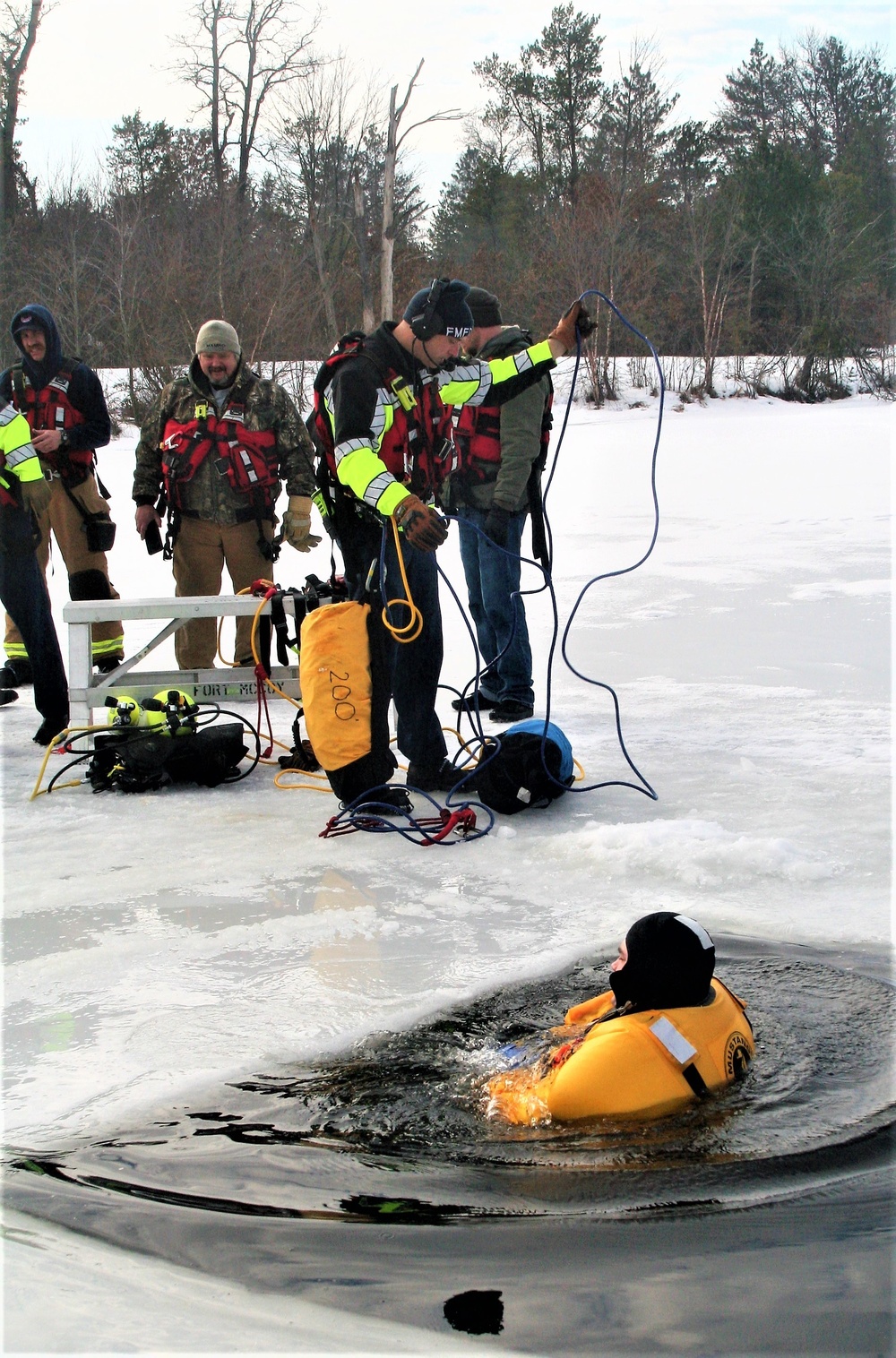 Fort McCoy firefighters train to save people clinging to ice with surface ice rescue training