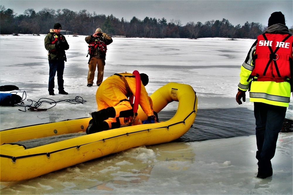 Fort McCoy firefighters train to save people clinging to ice with surface ice rescue training