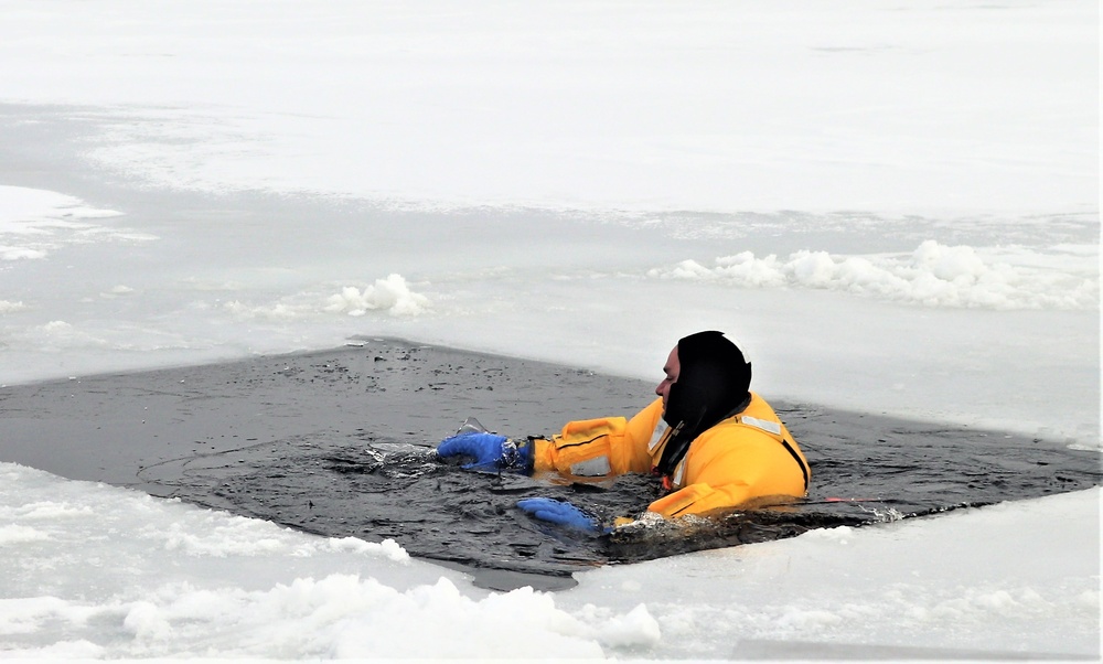 Fort McCoy firefighters train to save people clinging to ice with surface ice rescue training