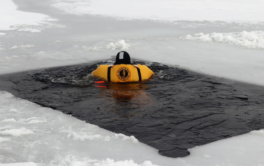 Fort McCoy firefighters train to save people clinging to ice with surface ice rescue training