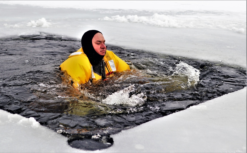 Fort McCoy firefighters train to save people clinging to ice with surface ice rescue training