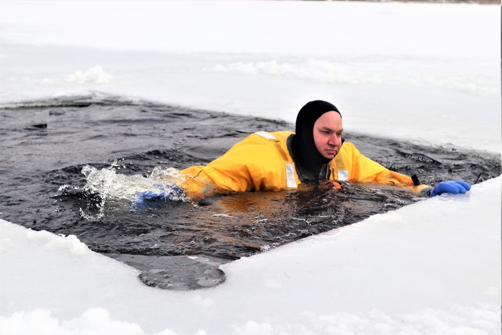 Fort McCoy firefighters train to save people clinging to ice with surface ice rescue training