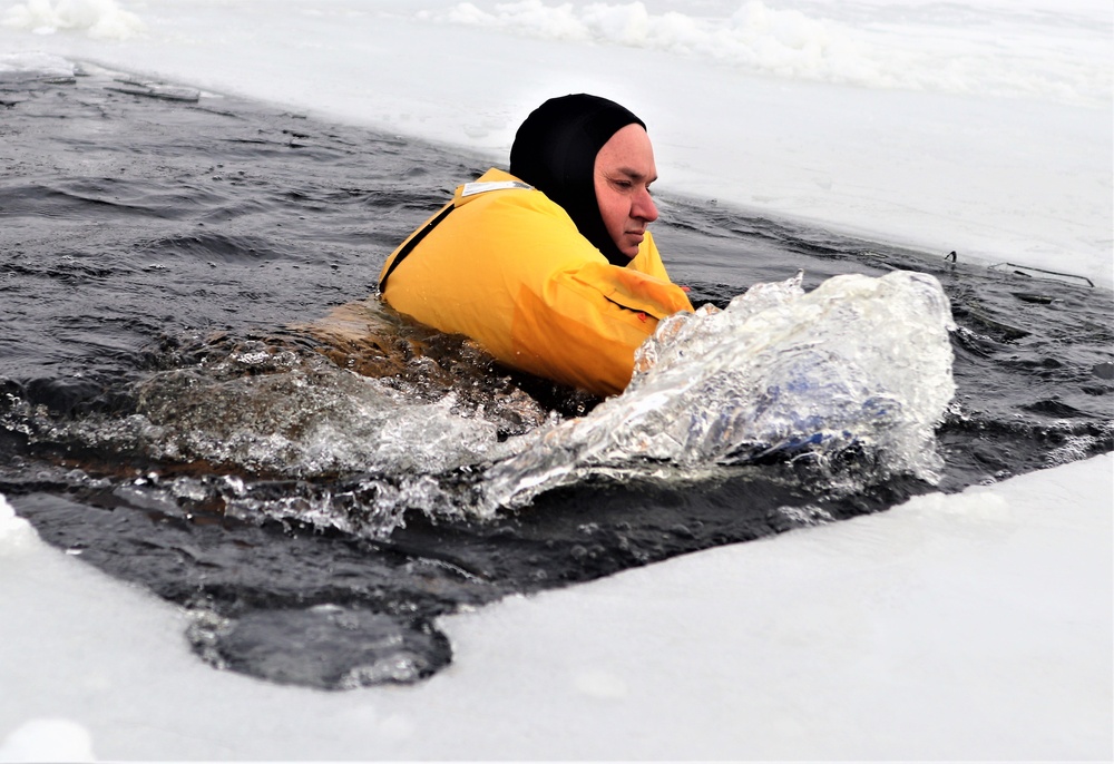 Fort McCoy firefighters train to save people clinging to ice with surface ice rescue training