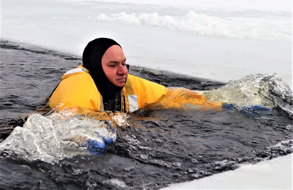 Fort McCoy firefighters train to save people clinging to ice with surface ice rescue training